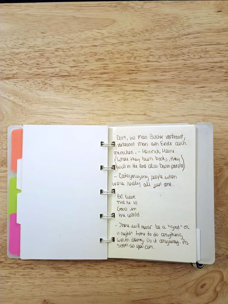 Filofax notebook with plain paper, with written quotations