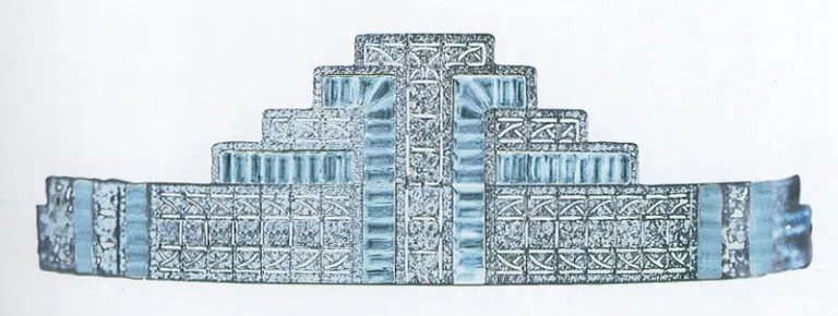 Art deco style platinum, diamond and aquamarine tiara in a geometric stepped design. The design looks like skyscrapers. 