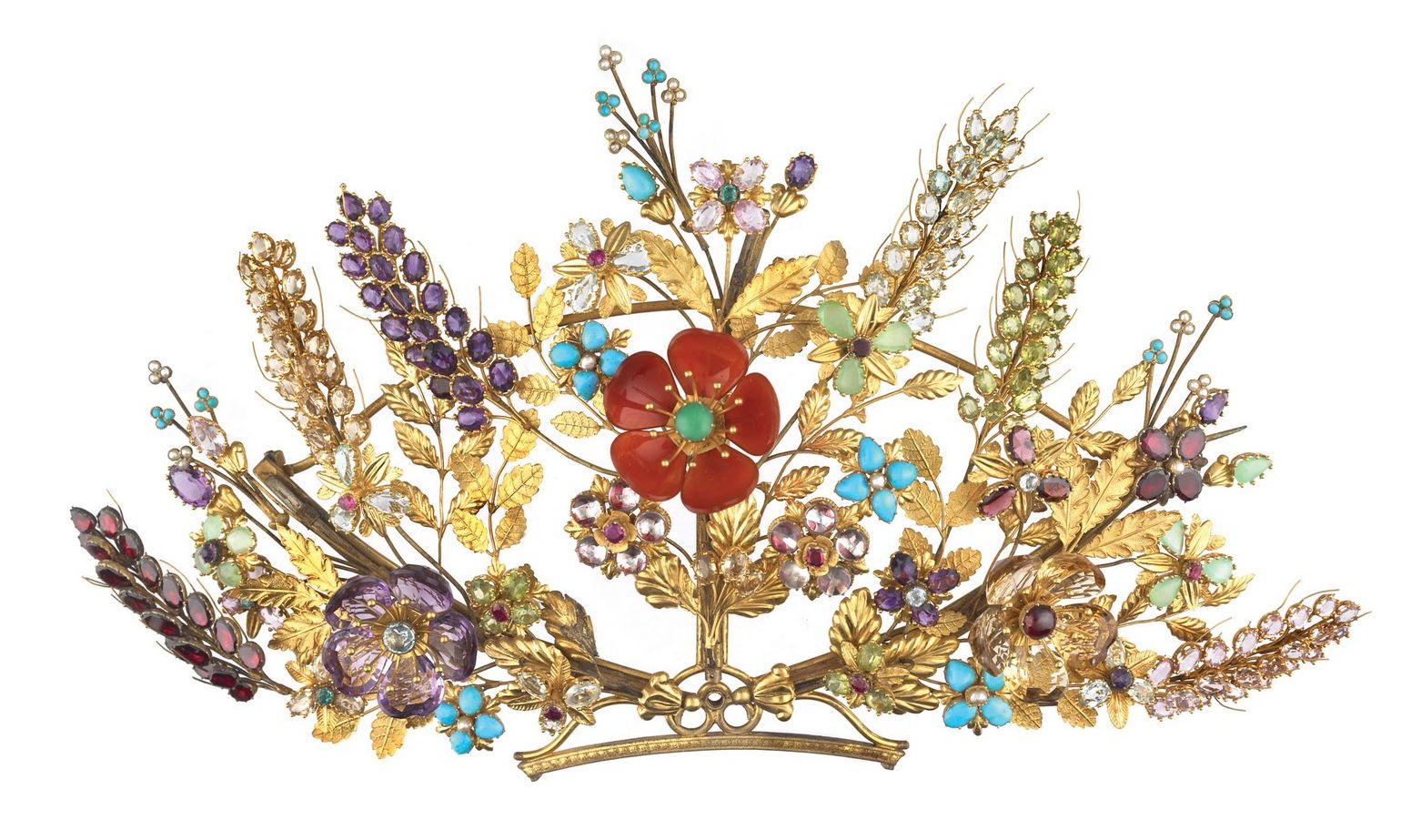 Tiara front or comb mount made out of gold wire, stamped and pressed sheet gold. To this structure a great variety of coloured gemstones have been attached including amethysts, almandine garnets, peridots, aquamarines, chrysophrases, citrines, turquoises and pearls. They have been massed naturalistically to create flower stems, petals and flowers.