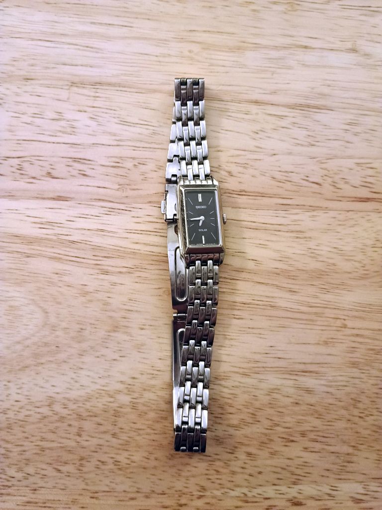 silver tone Seiko analog watch