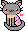 Gray kitty with pink inner ears and cheeks. Kitty has a yellow scarf with a purple dotted with darker purple section. There is a red to yellow gradient heart to the right.
